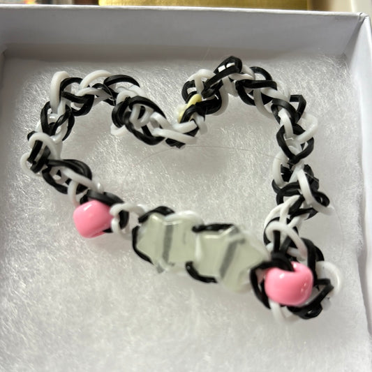 A hello kitty and kuromi necklace